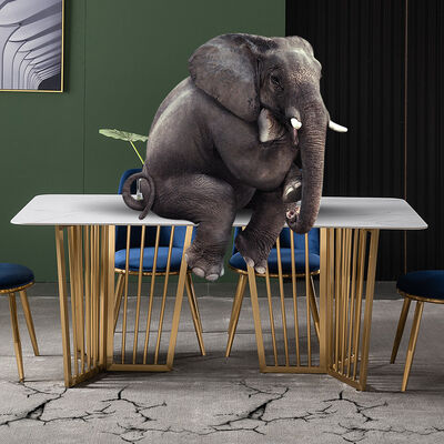 Buen precio Mesa de comedor de lujo y sillas del efecto de mármol blancas con la pierna de acero inoxidable UK-KD006 en línea